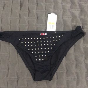 Guess swimming bottoms with metallic studs.